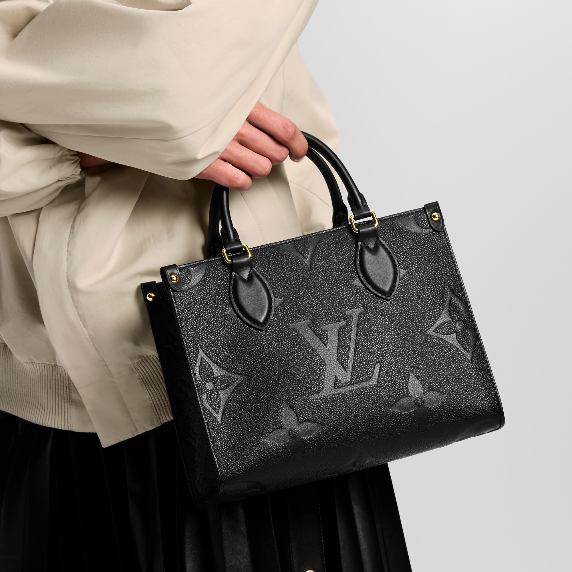 OnTheGo PM Monogram Empreinte Leather in Women